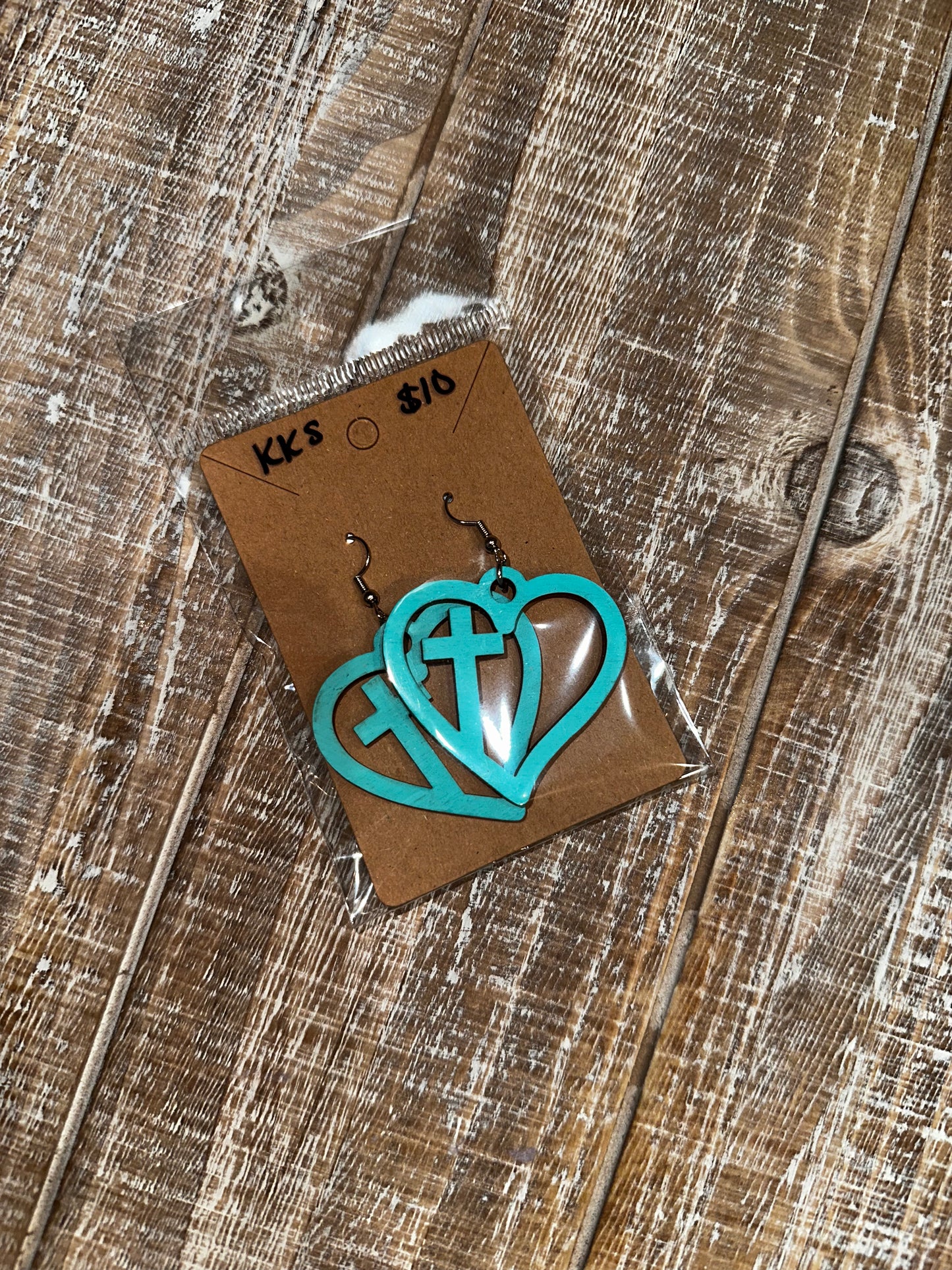 Teal cross/heart dangle