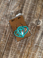 Teal cross/heart dangle
