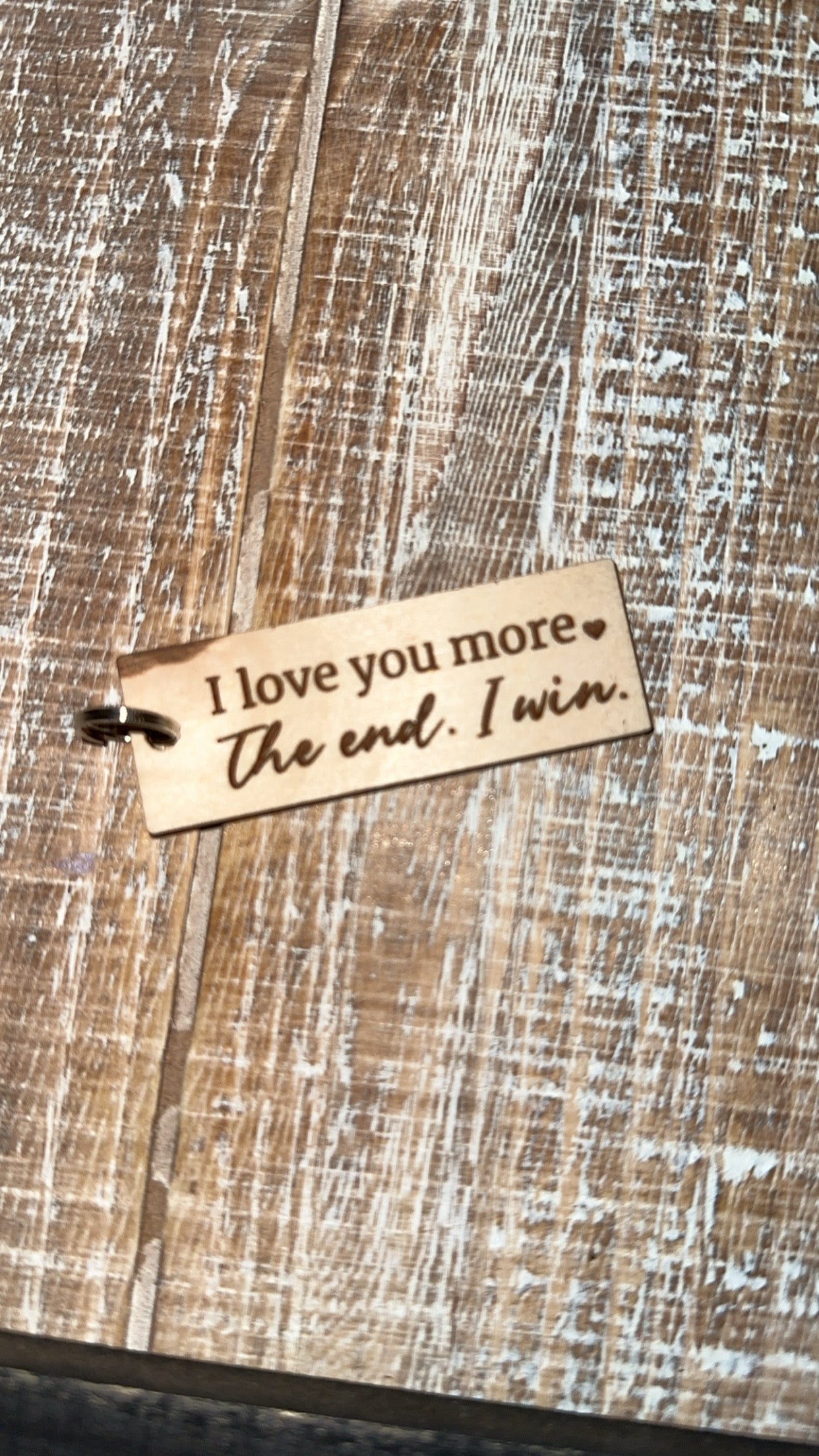 I love you more. I win. Keychain