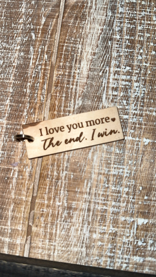 I love you more. I win. Keychain